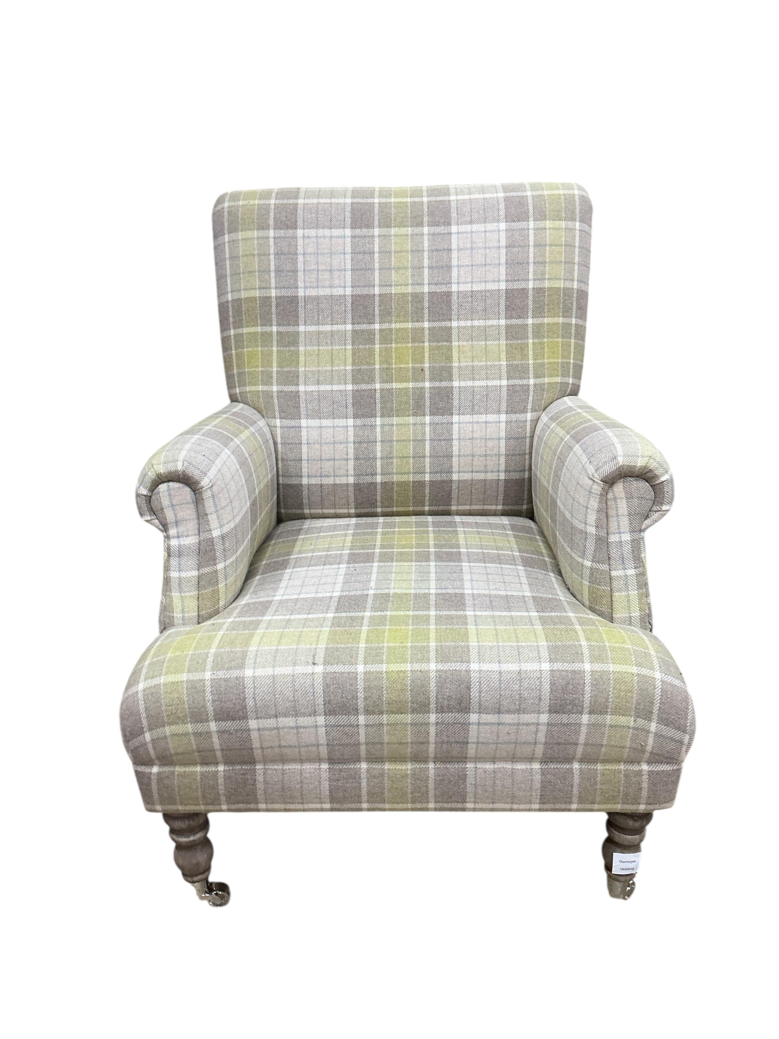 A modern Victorian style wing armchair upholstered in tartan type fabric, width 76cm, depth 76cm, height 90cm